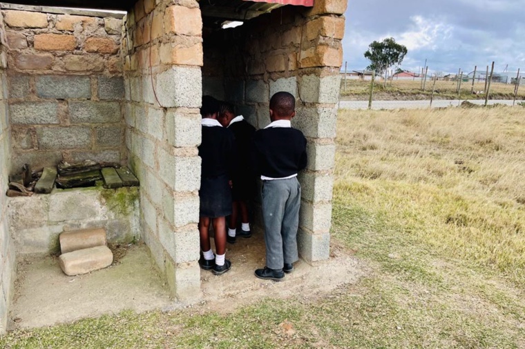 schooling children falling into Pit toilets every day